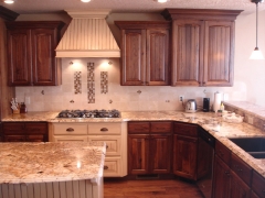 Magenta Wooden Cabinets with Beautiful Stove and Island - Kitchen