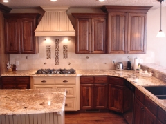 Magenta Wooden Cabinets with Beautiful Stove and Island - Kitchen