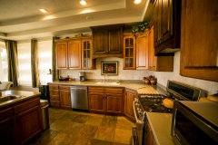 Brown Cabinet Kitchen with Tan Ceiling
